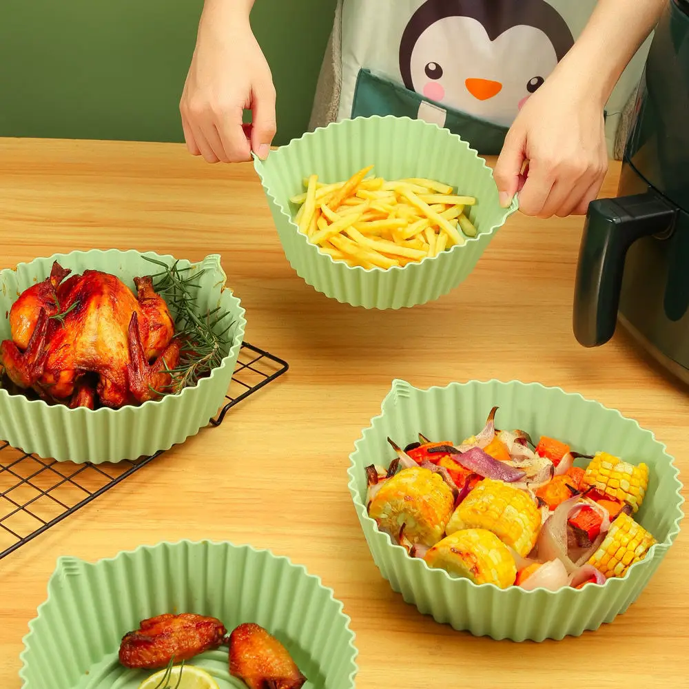 https://ae01.alicdn.com/kf/S94d97d1cd2224f68988b2061170da8a1F/14-16-18-5cm-Air-Fryers-Oven-Baking-Tray-Fried-Chicken-Basket-Mat-AirFryer-Silicone-Pot.jpg