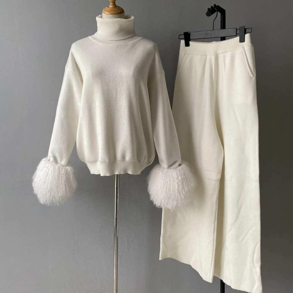 Women's casual two piece outfit with turtleneck and fur cuffs