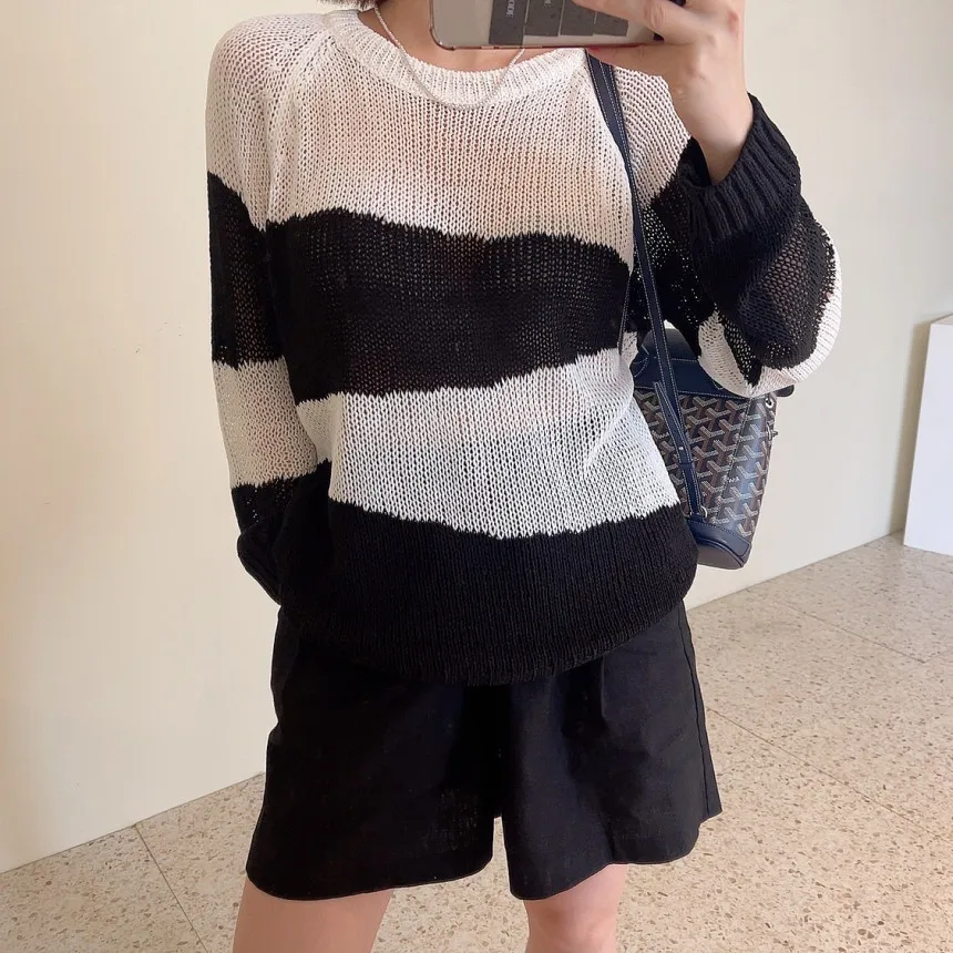 

chic autumn senior temperament round neck match color hollow knit design sense loose everything long sleeve sweater woman