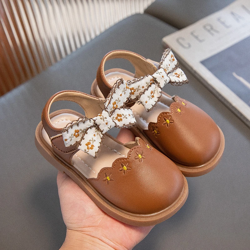 

Children's New Hollow Print Soft Sole Breathable Short Running Shoes Girls' Solid Color Big Bow Princess Sandals