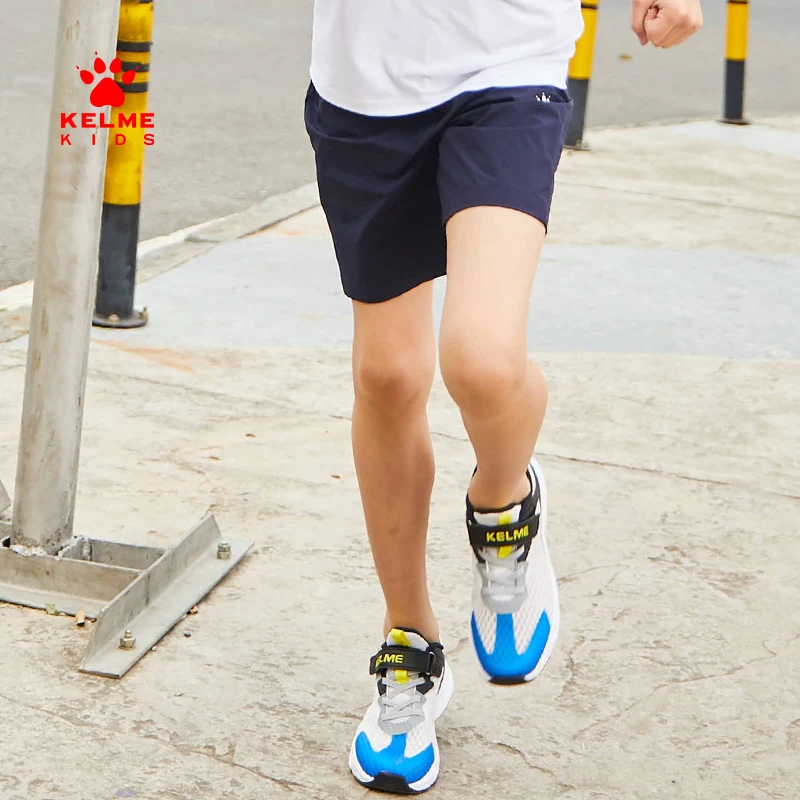 

Детская одежда KELME шорты для мальчиков летние спортивные пятиконечные брюки на молнии с карманами тканые тонкие детские брюки 5124DK3011