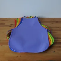 12 pièces enfants colorés enfants tabliers Non-tissé tissu Art imperméable tablier bavoir bébé travail maternelle activités scolaires 4