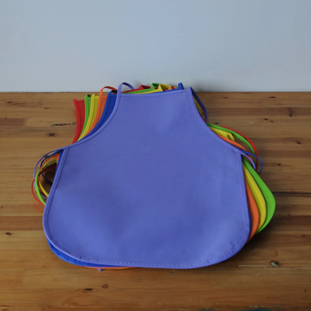 12Pcs Kids Colorful Children Aprons Non-Woven Fabric Art Waterproof Apron Bib Baby Work Kindergarten School Activities 4