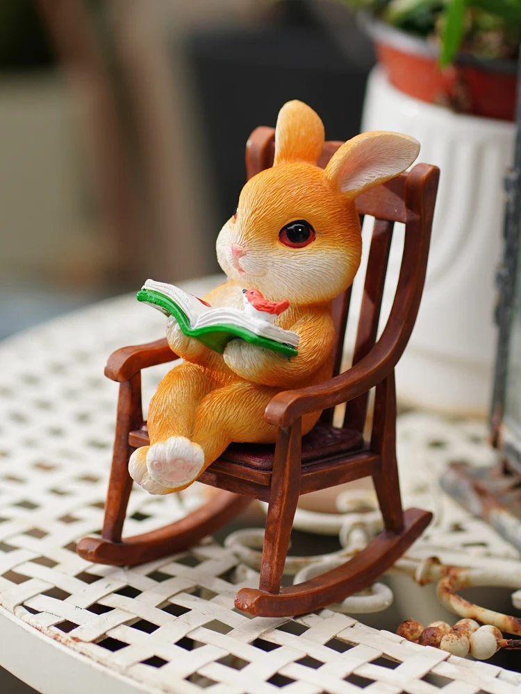 

Cute office desk, rabbit reading, rocking chair decoration, garden balcony, courtyard landscaping, potted plant decoration, gift