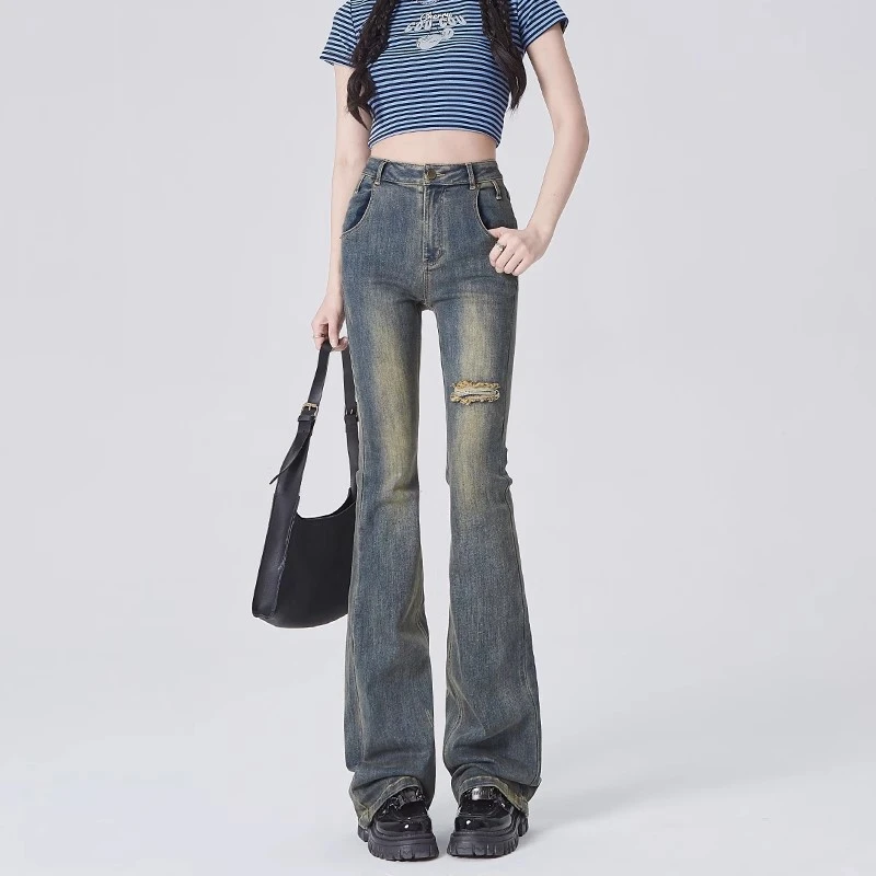 

Retro blue broken holes micro-large jeans female 2024 early spring new Spice Girls high-waisted thin straight horseshoe pants