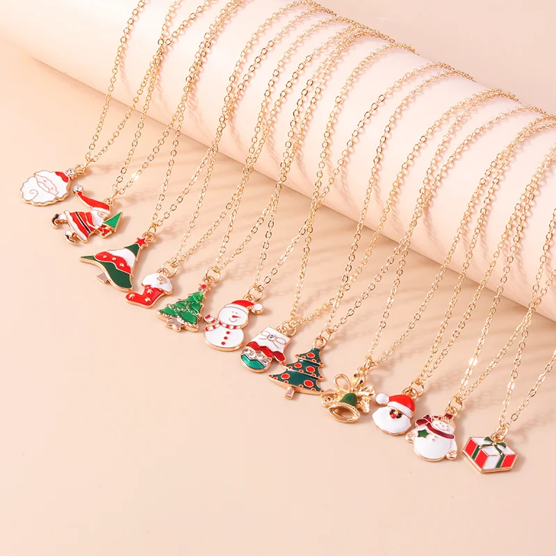 Leslie 4-teiliges Weihnachts-Halsketten-Set, Emaille, Weihnachtsmann, Glocke, Schneeflocke, Hirschbaum, Anhänger, Halskette für Frauen, Neujahrsgeschenk – Detail 3