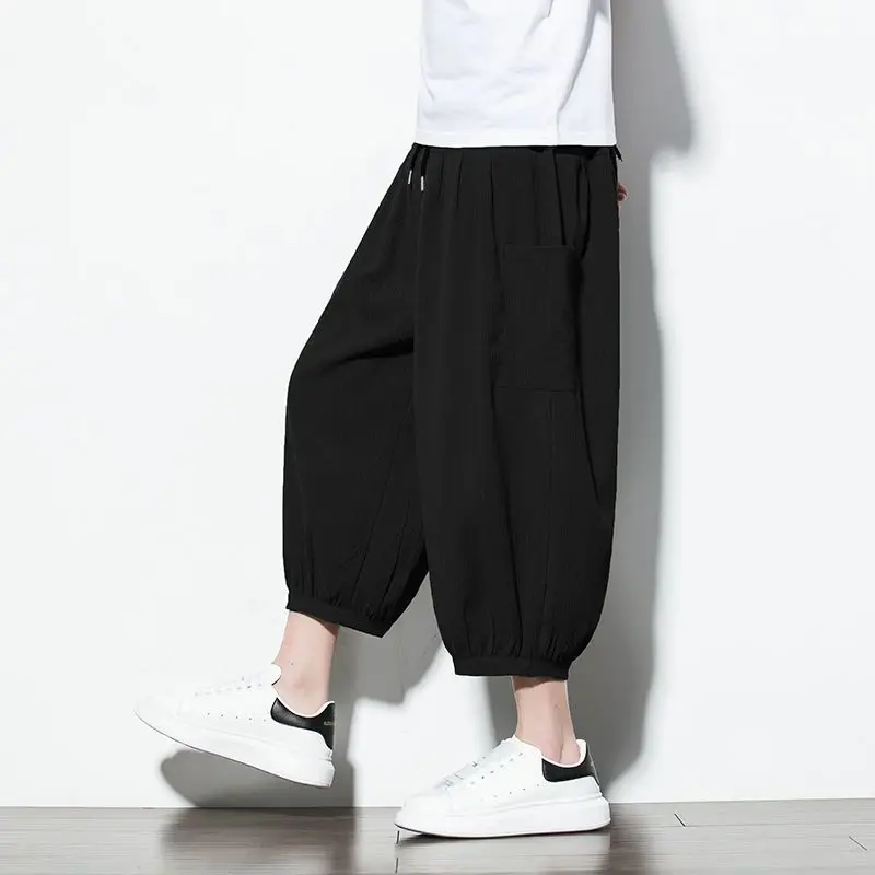 Fashion Elastic Lace Up Solid Color Pockets Harem Casual Pants Men's Clothing 2024 Spring Summer New Loose Korean Cropped Pants