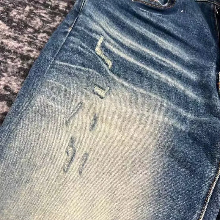 men ripped leather patch distressed mx1 indigo jeans 3