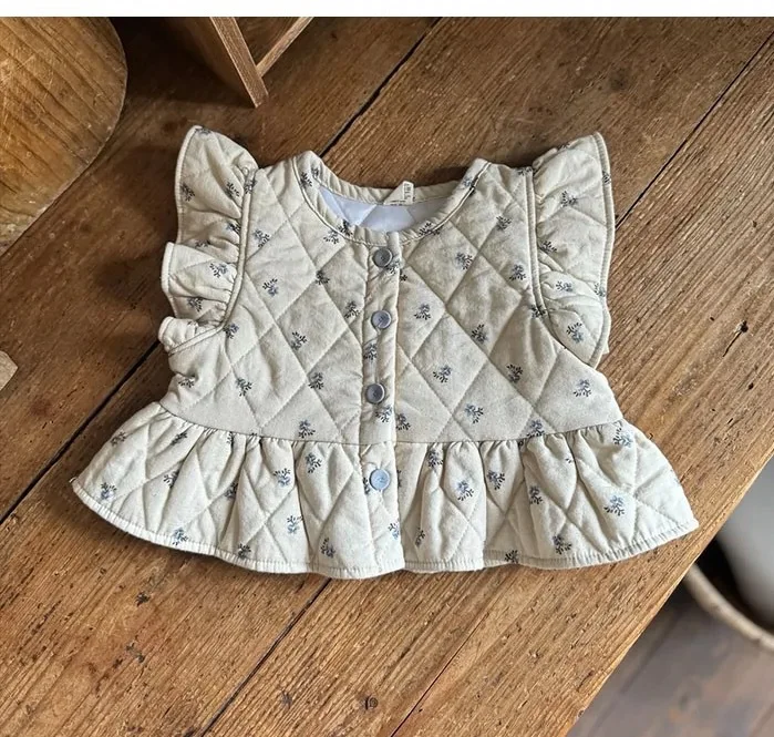 blue vest