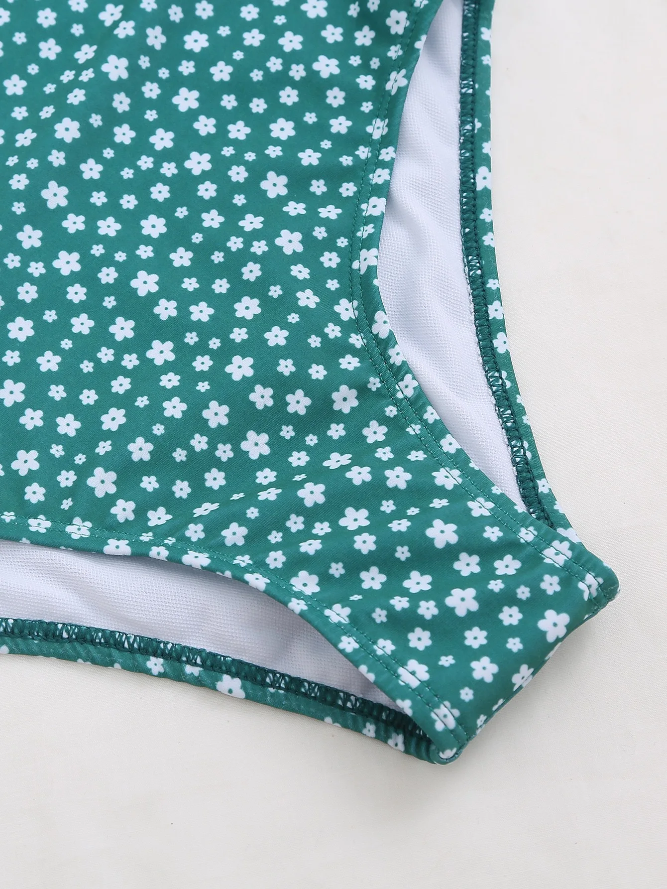 Women's green polka dot bikini swimsuit packaging