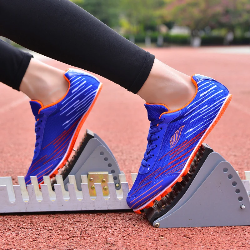 Fashion Men Women Track and Field Nail Shoes Running Training Ultra Light Soft Track and Field Athletes Running Spiked Shoes