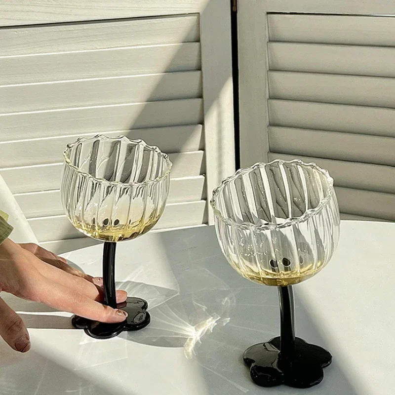 https://ae01.alicdn.com/kf/S956396bdd13149f281a35fd2c6392d82j/Flower-Champagne-Glass-Slanting-Flower-Glass-Goblet-Transparent-Vertical-Vintage-French-Wine-Glass-Gift.jpg