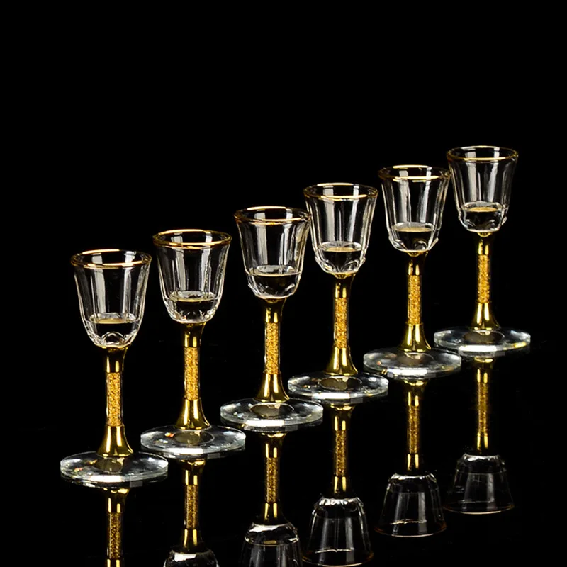 https://ae01.alicdn.com/kf/S958112e3271d45b7930dd45b870c74e1b/5-65ml-Creative-Gold-Foil-Shot-Glass-Lead-Free-Crystal-Glass-Goblet-Vodka-Spirits-Wine-Set.jpg
