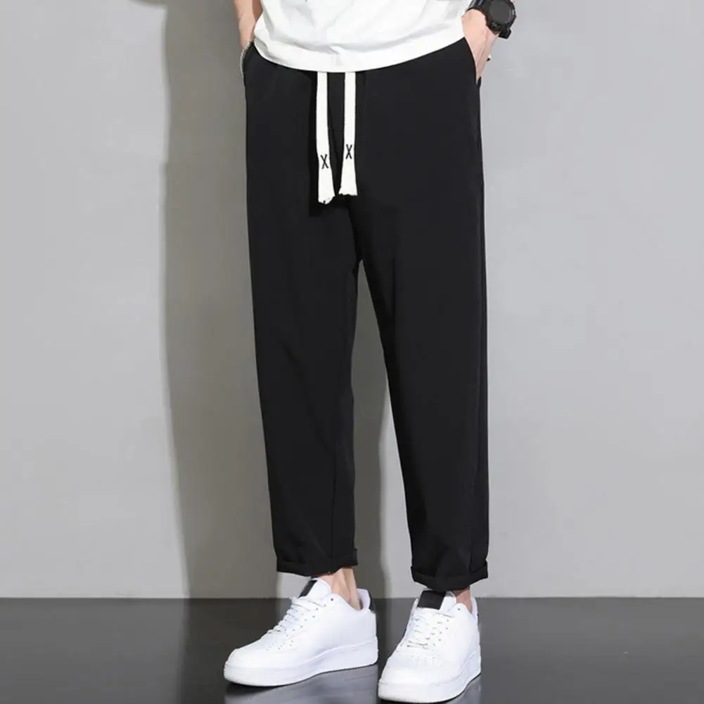 

Men Ninth Pants Quick Dry Men's Gym Training Jogging Sweatpants With Side Pockets Elastic Waist Wide Leg Solid Color Long
