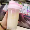 500ml/700ml Portable Protein Powder Shaker Bottle Leak Proof Sports Mixing Cup Water Bottle for Gym Fitness Training with Scale 4