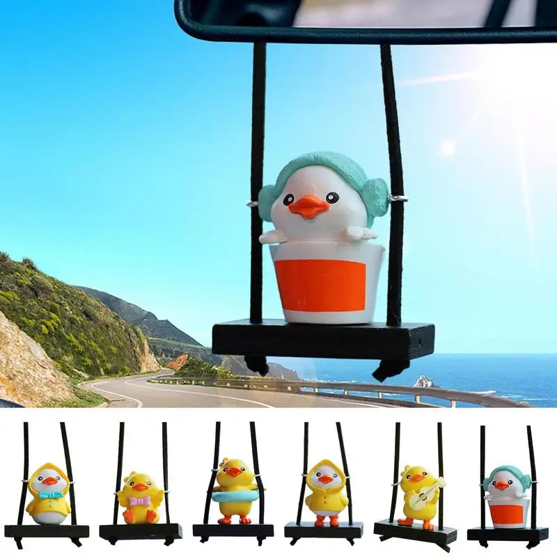 

Cartoon Cute animated car accessories Funny Raincoat Swinging Duck Car rearview mirror ornaments car interior Accessories