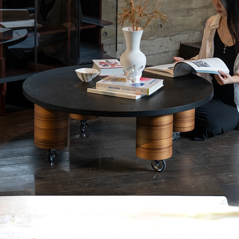 

Movable wooden coffee table in the living room, circular and luxurious retro dining table