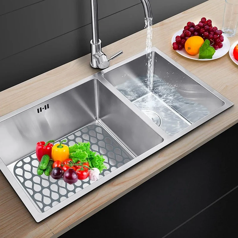 https://ae01.alicdn.com/kf/S95a17678fe6243e39763324f2e5e1952Z/Silicone-Sink-Protectors-For-Kitchen-Folding-Non-Slip-Sink-Mat-Grid-For-Bottom-Of-Stainless-Steel.jpg