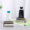 Bathroom Accessories Set Rolling Toothpaste Squeezer Tube Stainless Steel Toothpaste Dispenser Toothpaste Cosmetic Storage Rack 4