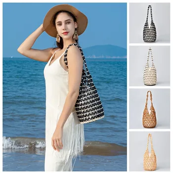 Borsa a mano intrecciata alla moda in stile bohémien Borsa scavata fatta a mano in stile femminile Design raffinato Borsa da spiaggia estiva Stagione estiva