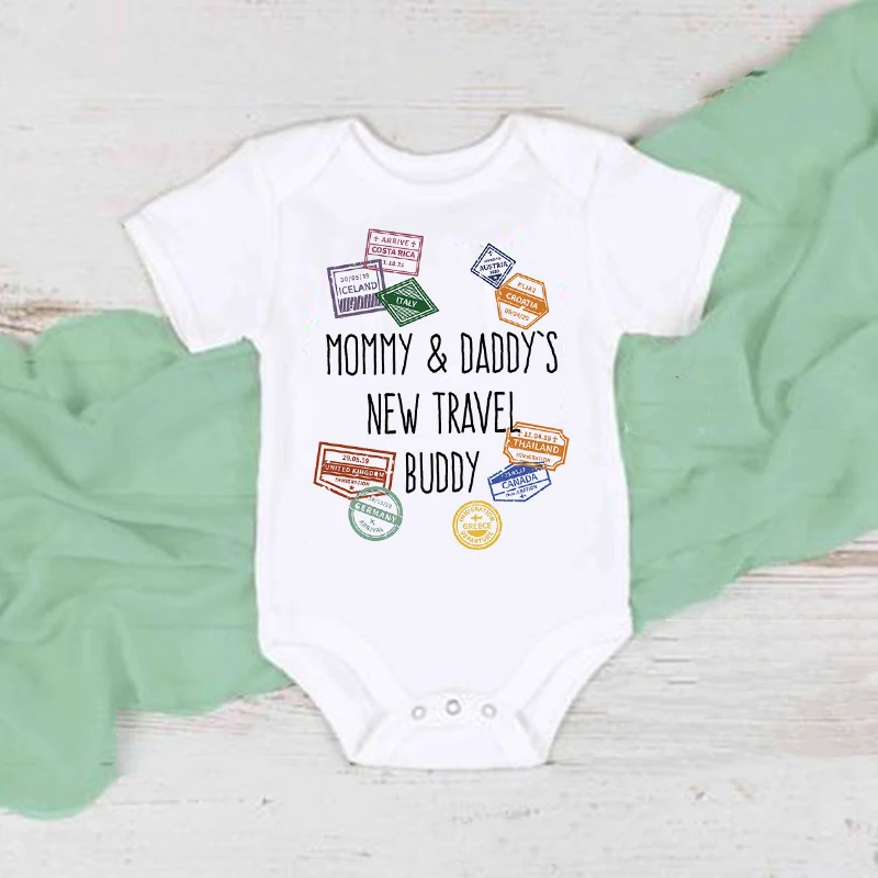 

Mommy and Daddy's New Travel Buddy Baby Bodysuit Funny Infant Toddler Romper Traveller Passport Stamps Print Newborn Shower Gift