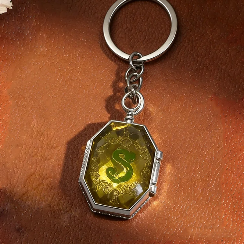 Sparkle Gem Keychain: Multi-Faceted Green/Yellow Crystal with Metal Rim and Unique Anti-Loss Design