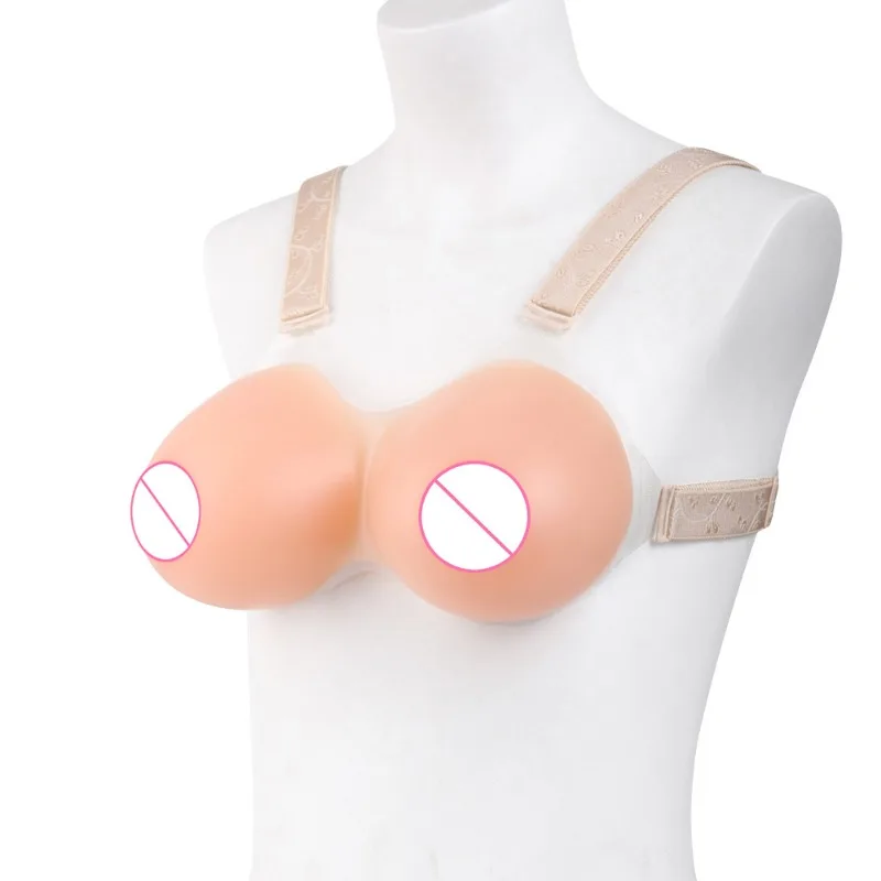 

Cloth Shoulder Strap with Concave Bottom and Round Protruding One-piece Silicone False Breast Activity Accessory
