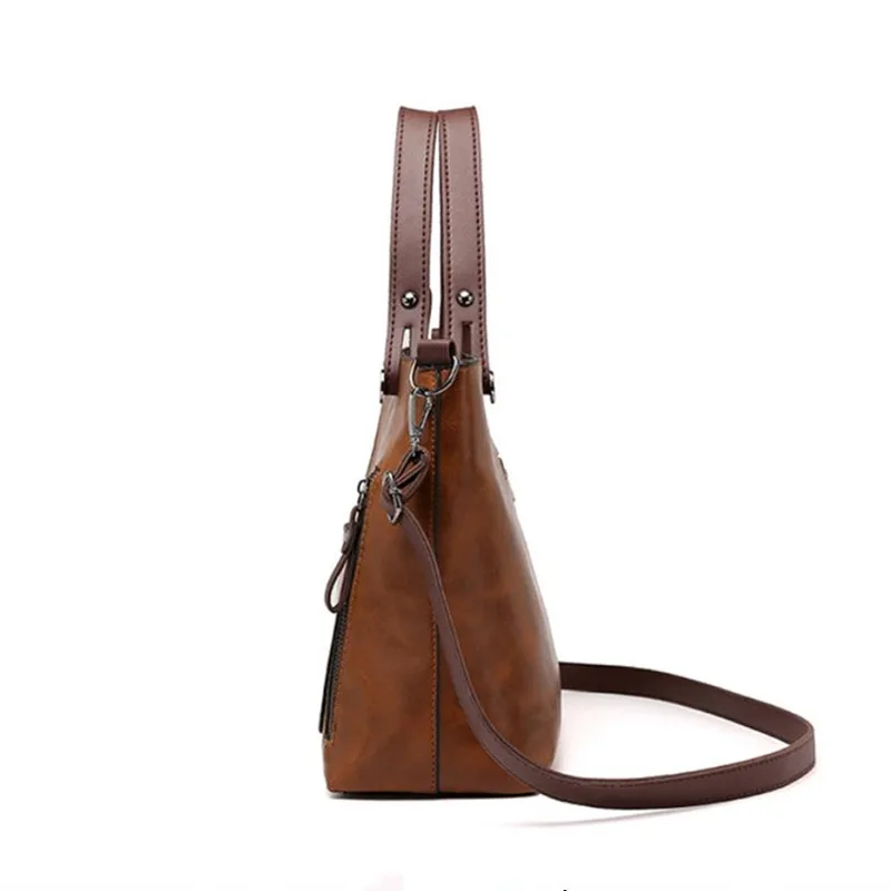 Retro leather handbag with two zipper pockets, versatile tote and crossbody style, classic women’s work and business bag.00021