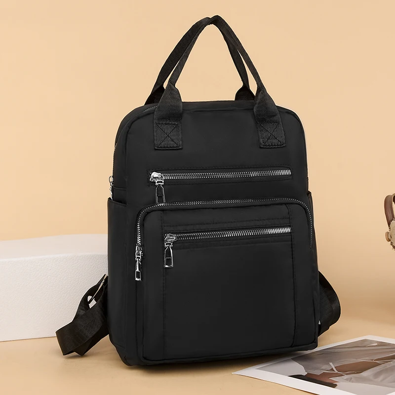 1 medium-sized classic women's backpack with adjustable shoulder straps, suitable for outdoor, travel, and back to school multif