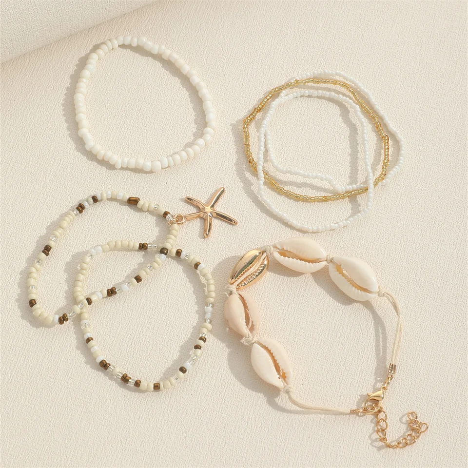 Bracelet Plaqué Or étoile De Mer, Dollar Et Perles - Marque Clovers - Neuf Avec étiquettes