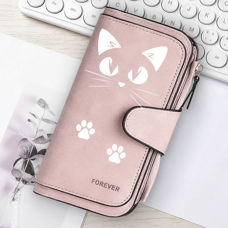 Featuring a cat motif this women's long wallet offers multiple card slots a coin pocket and a cell phone pouch A perfect gift