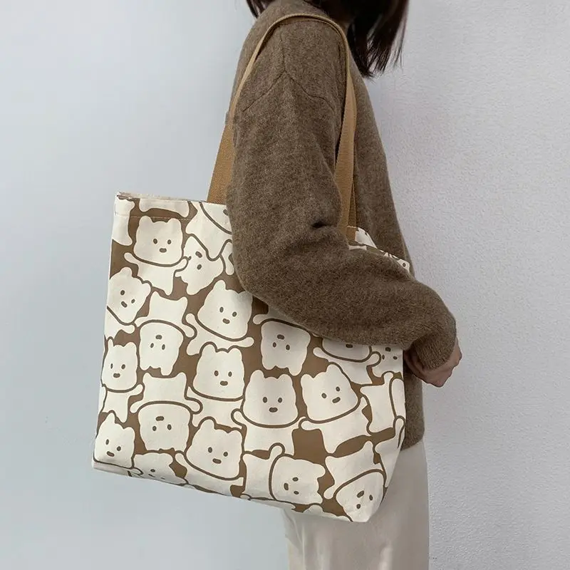 

New Korean version canvas bag with large capacity fashionable shoulder bag for female students book carrying bag Summer bags