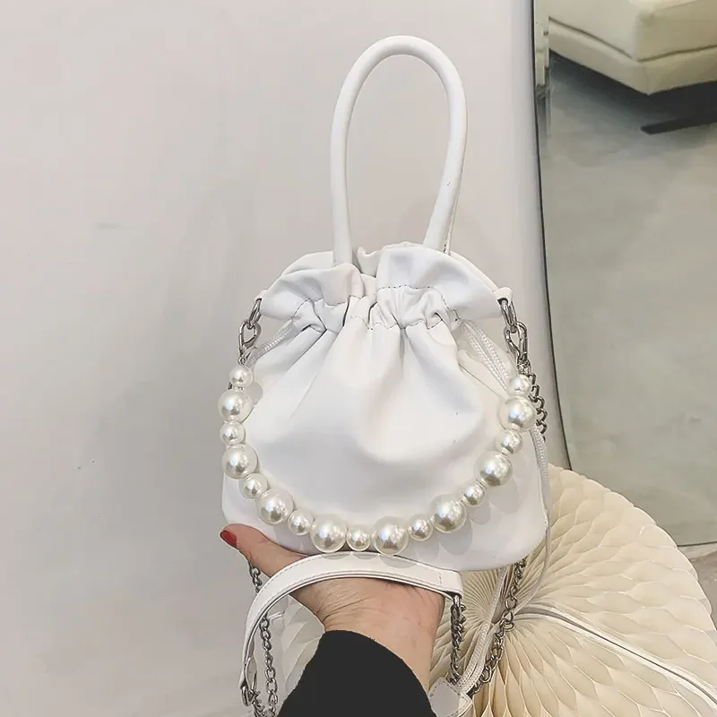Hand-held pleated bag for women summer 2023 new trendy fashion pearl bucket bag niche design versatile crossbody bag