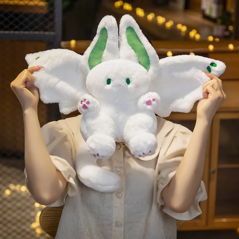 カワイイバンニーぬいぐるみクッション魔法のような白い精神的な