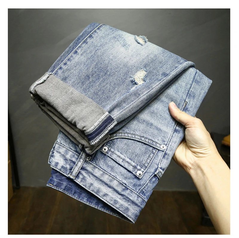 Description Picture 5 of itemRipped Jeans Men Light Blue Ankle Length Pants Harem Broken Distressed Baggy Pants Loose Fit Original Taper Jeans Mens Clothing