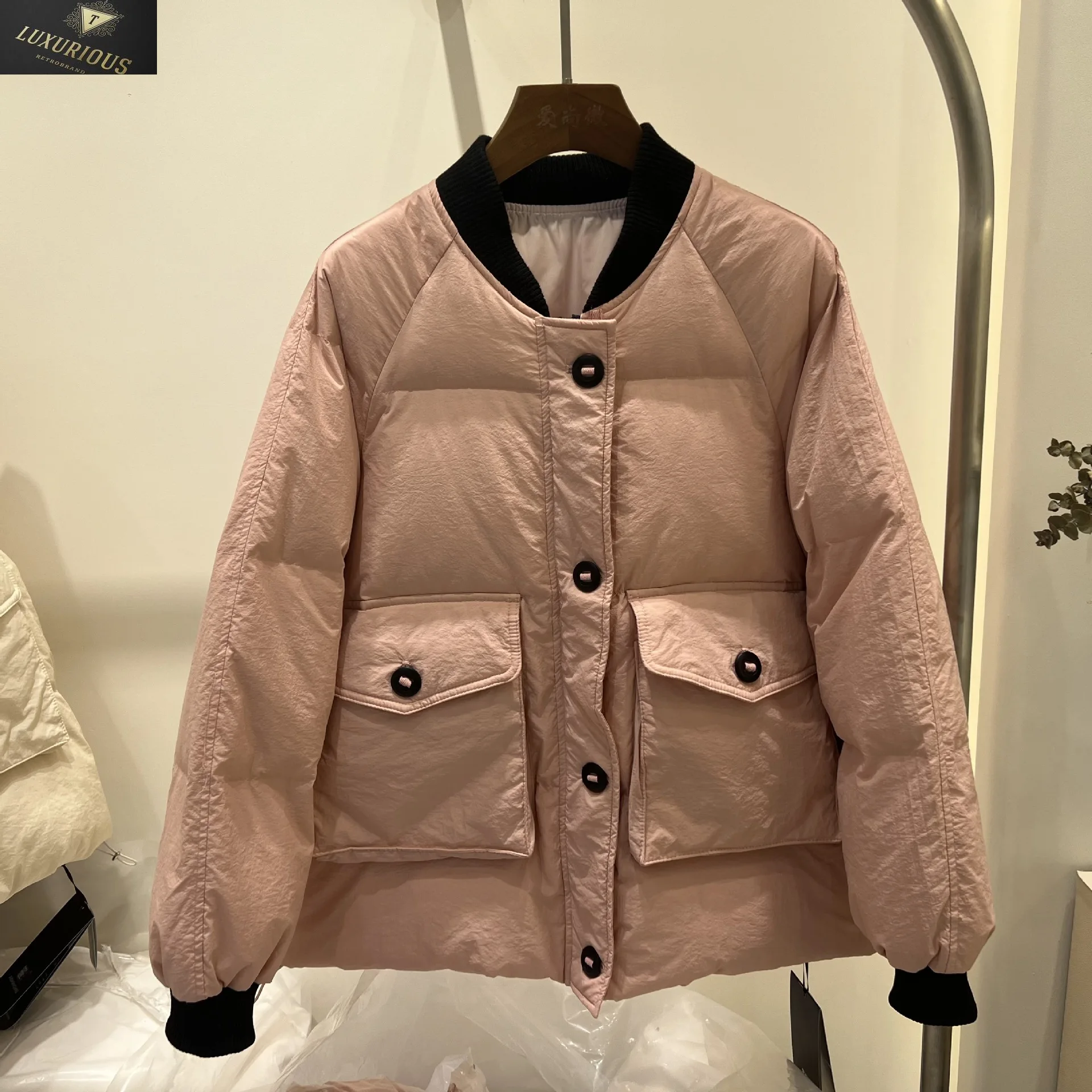 

2023 autumn and winter new anti-season clearance down jacket women's short baseball neck round thick white duck coat