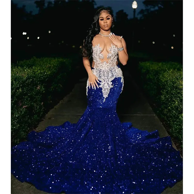 

2024 Royal Blue Black Girls Sheer Neck Prom Dresses Sequins Beaded Appliques Sweep Train Mermaid Formal Occasion Gowns