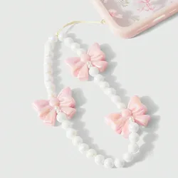 Elegant Pink Pearl Bow Phone Chain Wrist Strap with Keychain Attachment (1)