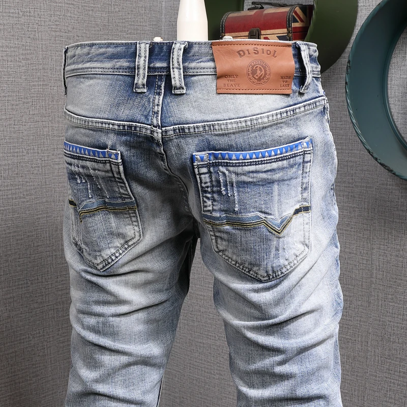 Fashion Designer Men Jeans Retro Light Blue Stretch Slim Fit Printed Ripped Jeans Men Vintage Elastic Casual Denim Pants Hombre