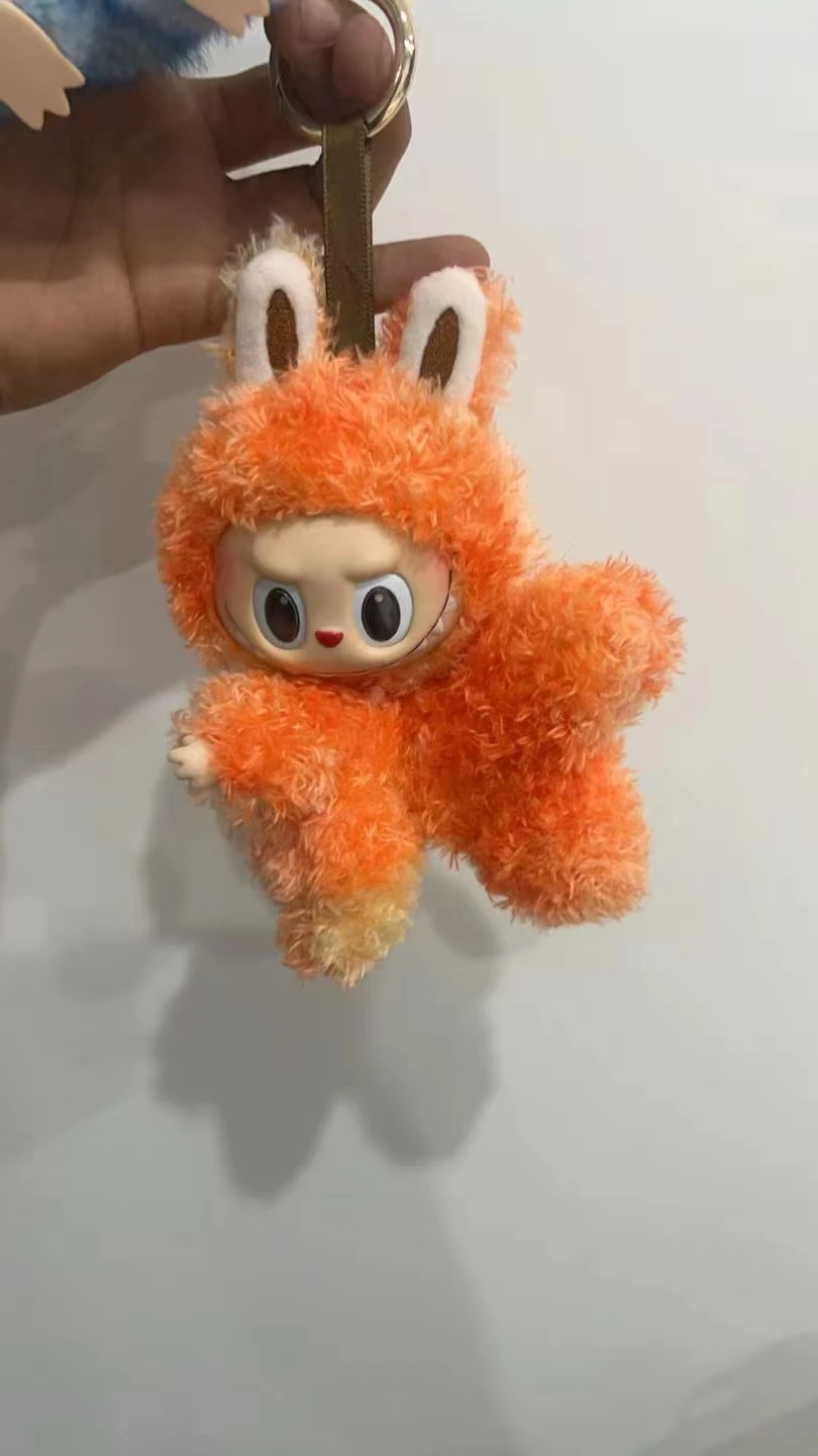 Labubu-style 17CM plush doll with vinyl face and soft costume – collectible gift toy with free shipping to Singapore.