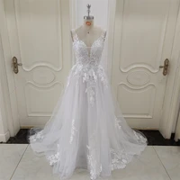 ZJ6002 Customized Boho V-neck Wedding Dresses Spaghetti Straps Appliques Corset Beach Tulle Bridal Gown Lace Floor Length 1