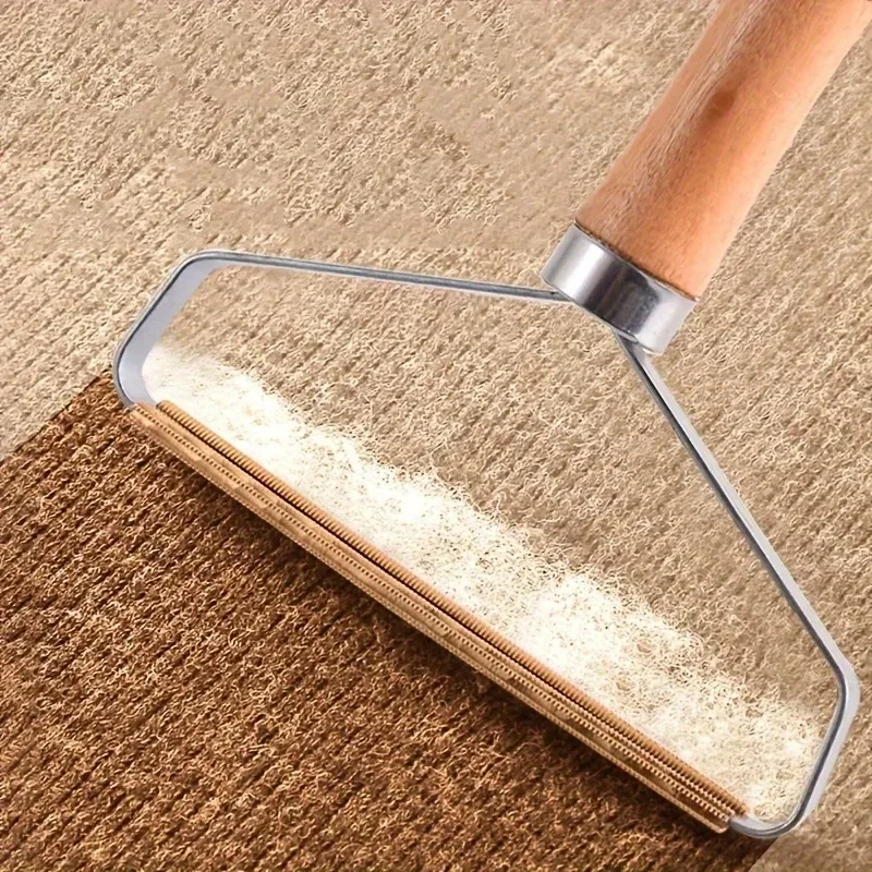 Wooden handle pet hair brush close-up