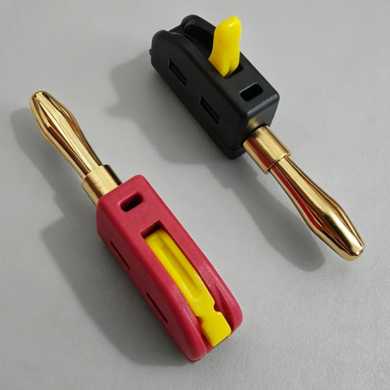 Lot de deux prises banane 4mm sans soudure, parfait pour des connexions audio ou de test.