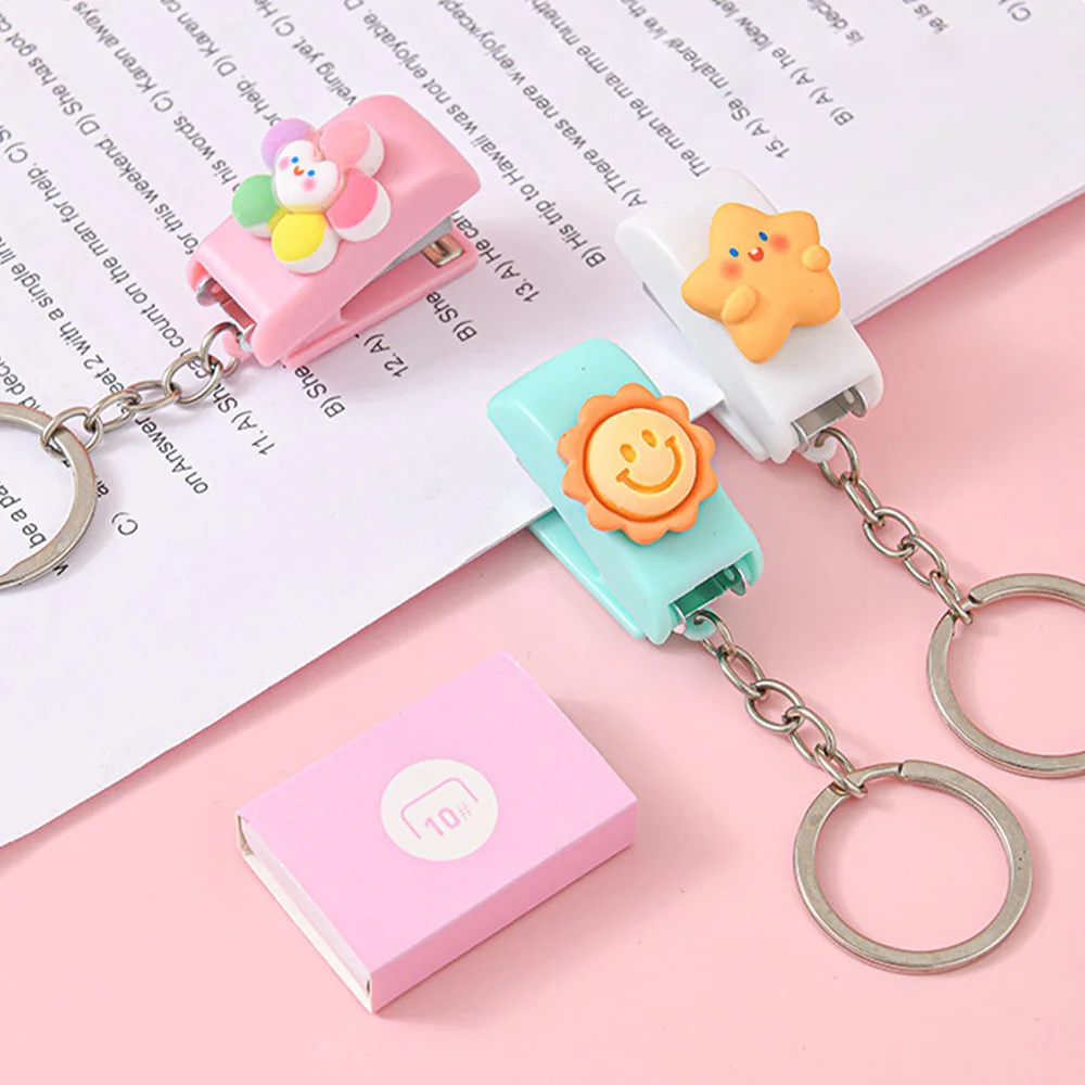 1pc Pink/white cartoon student mini stapler, small and portable, can be used as a keychain, with size 10 staples