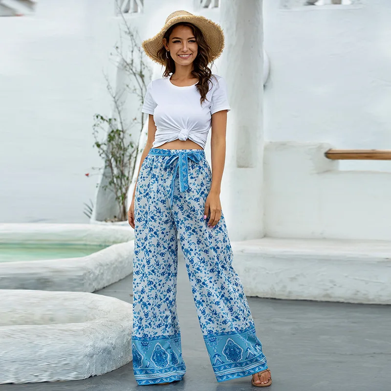 Women White  Green Floral Printed Relaxed Loose Fit HighRise Pleated  Trousers  Berrylush