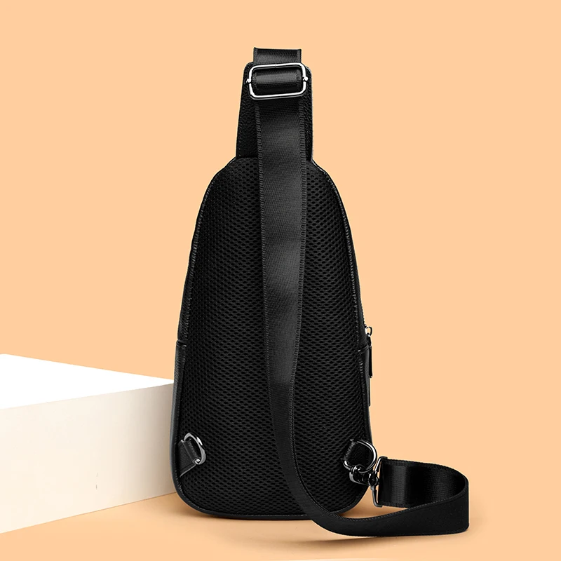 Stylish genuine leather sling bag for men with multiple compartments, ideal for everyday carry or travel