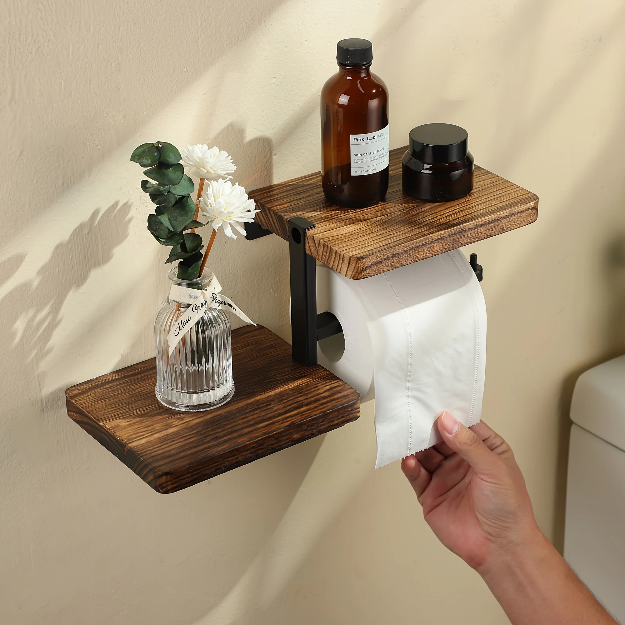 Wooden toilet paper holder showing integrated shelf and tissue roll dispenser detail