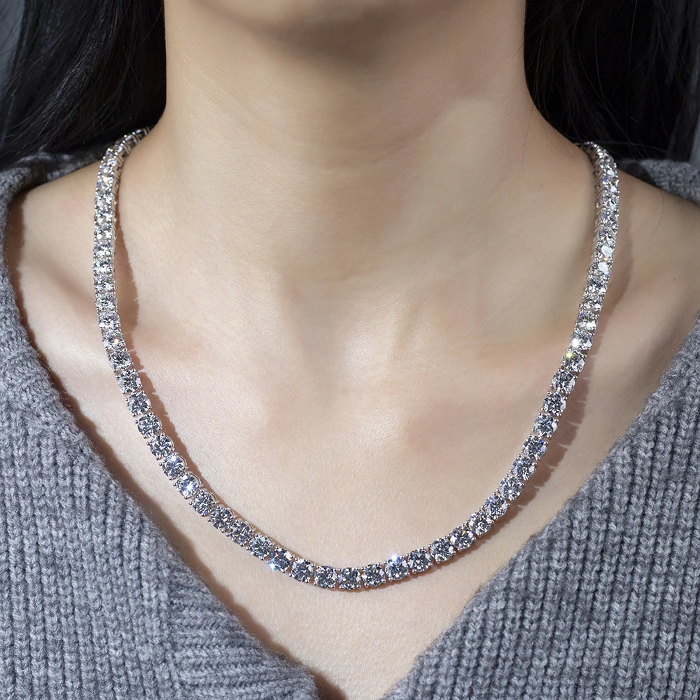 Platinum lab diamond pendant necklace lifestyle shot worn on neck with gray sweater – Vexaro