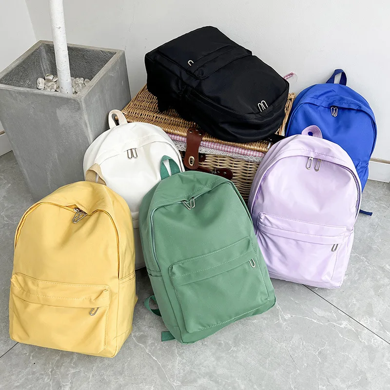 

High Quality New Waterproof Nylon Women Backpack Female Travel Bag Backpacks Schoolbag for Teenage Girls Solid Color Bookbag