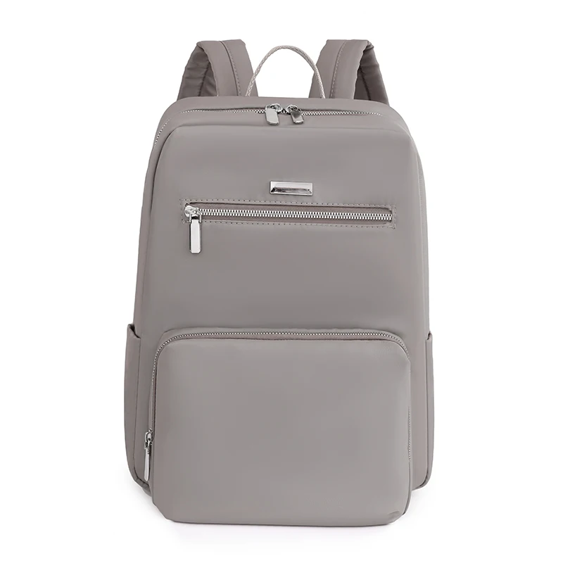 thumbnail image 1 of Mochilas de nailon de color liso para mujer, impermeables, de gran capacidad, sencillas, para estudiantes, multifuncionales, para viajes y escuela, 2023, 1 of 4